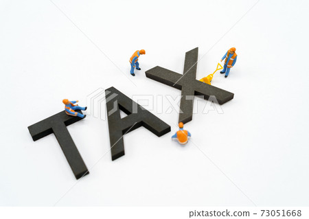 Miniature people Pay queue Annual income (TAX) for the year on calculator. using as background business concept and finance concept with copy space for your text or design. Miniature people Pay queue Annual income (TAX) for the year on calculator. using as background business concept and finance concept with copy space for your text or design. 73051668
