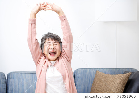 Senior woman stretching Senior woman stretching 73051969