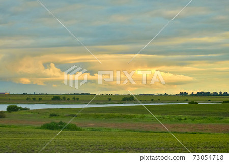 Sunset on the road to Blagoveshchensk. Sunset on the road to Blagoveshchensk. 73054718