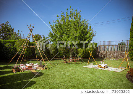 Tipi made of sticks as a wedding decoration Tipi made of sticks as a wedding decoration 73055205