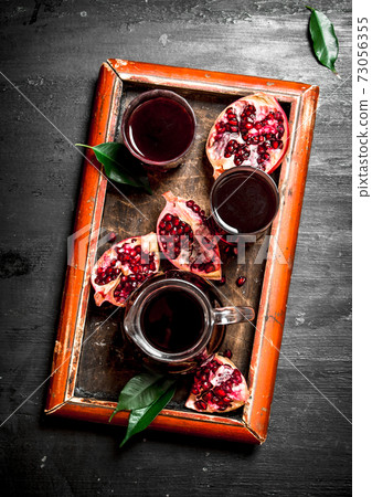 The fresh juice of ripe pomegranate. The fresh juice of ripe pomegranate. 73056355