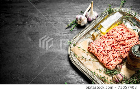 Fresh minced meat with garlic and spicy herb. Fresh minced meat with garlic and spicy herb. 73057408