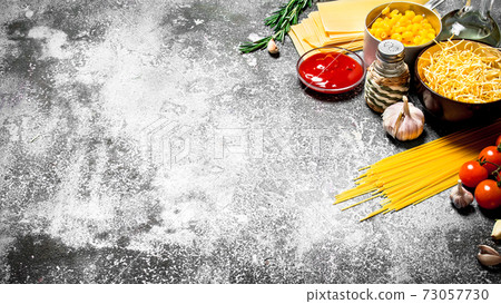 Various pasta with tomato sauce , spices and rosemary. Various pasta with tomato sauce , spices and rosemary. 73057730