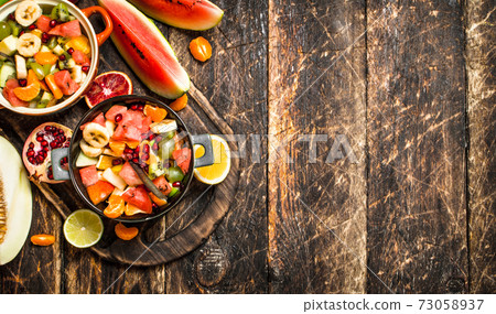 Summer food . Salad of tropical fruits. Summer food . Salad of tropical fruits. 73058937