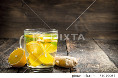 Ginger tea with mint and lemon. Ginger tea with mint and lemon. 73059061