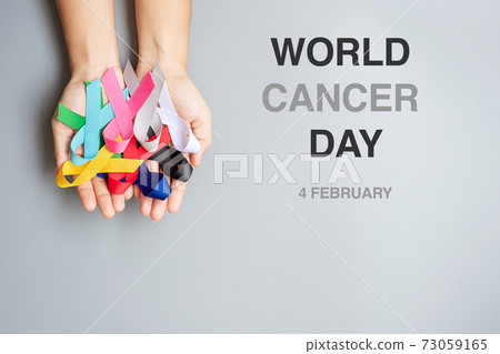 World cancer day (February 4). colorful awareness ribbons; blue, red, green, black, grey, white, pink and yellow color for supporting people living and illness. Healthcare and medical concept 73059165
