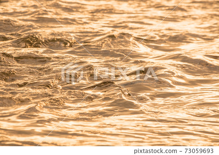 River flow / waves (warm colors) 73059693