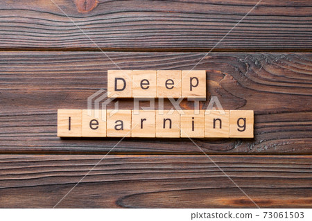 Deep Learning word written on wood block. Deep Learning text on wooden table for your desing, concept 73061503