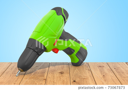 Screw gun on the wooden planks, 3D rendering 73067873
