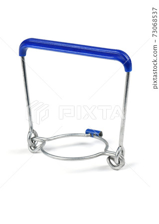 Handle holder for plastic bottle on the white background. 73068537