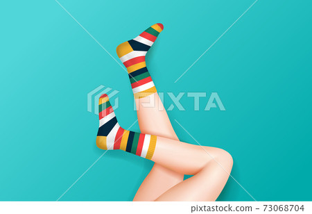 Female Legs In Striped Socks 73068704