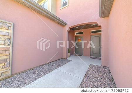 Front doors and entrance of modern pink duplex Front doors and entrance of modern pink duplex 73068732