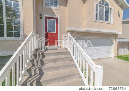 Front door and steps of traditional, modern home Front door and steps of traditional, modern home 73068784