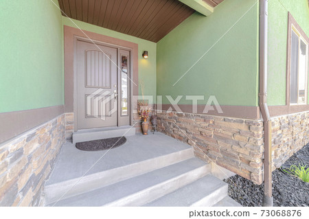 Front porch step and door of traditional home Front porch step and door of traditional home 73068876