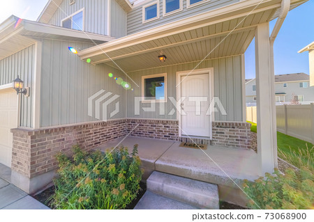 Front door and porch of modern two storey home Front door and porch of modern two storey home 73068900