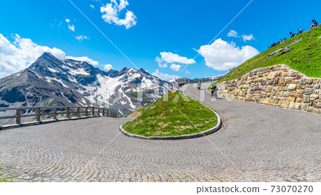 Mountain cobbled road serpentine Mountain cobbled road serpentine 73070270
