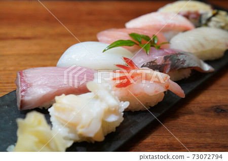 Hokuriku specialty nigiri sushi platter, baby shellfish, sweet shrimp, yellowtail 73072794