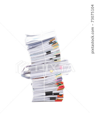 Stack of business papers isolated on white background Stack of business papers isolated on white background 73075104