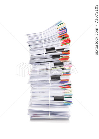 Stack of business papers isolated on white background Stack of business papers isolated on white background 73075105