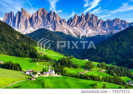 Santa Maddalena village, Dolomites mountains in background, Famous alpine place Santa Maddalena village, Val di Funes valley, Trentino Alto Adige region, Italy, Europe Santa Maddalena village, Dolomites mountains in background, Famous alpine place Santa Maddalena village, Val di Funes valley, Trentino Alto Adige region, Italy, Europe 73075151