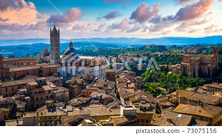 Siena beautiful medieval town in Tuscany, Dome and Bell tower of Siena Cathedral, Old Town medieval city of Siena, Tuscany, Italy Siena beautiful medieval town in Tuscany, Dome and Bell tower of Siena Cathedral, Old Town medieval city of Siena, Tuscany, Italy 73075156