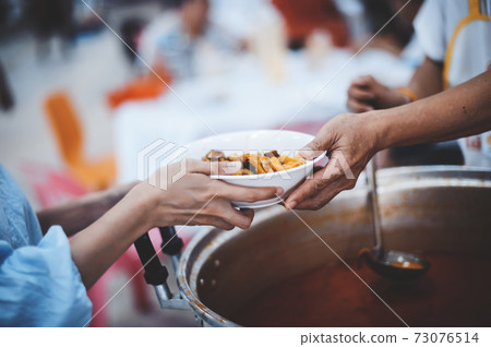 Providing free food to the poor 73076514