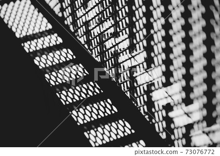 black and white light and shade of shadow metal fence pattern abstract texture art for decoration. 73076772