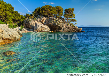 Beautiful rocky peninsula beach,Brela,Dalmatia region,Croatia,Europe Beautiful rocky peninsula beach,Brela,Dalmatia region,Croatia,Europe 73077686