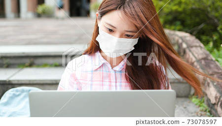College student use laptop College student use laptop 73078597