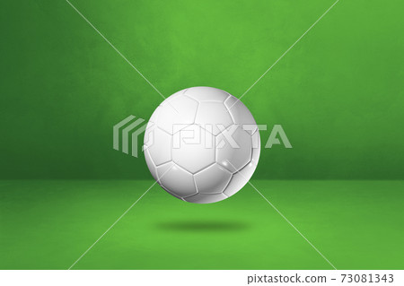White soccer ball on a green studio background White soccer ball on a green studio background 73081343