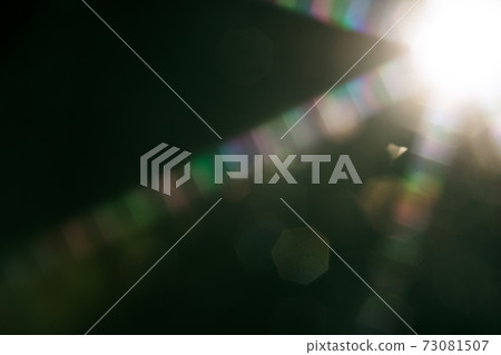 Abstract sun flare. The lens flare is subject to digital correction 73081507