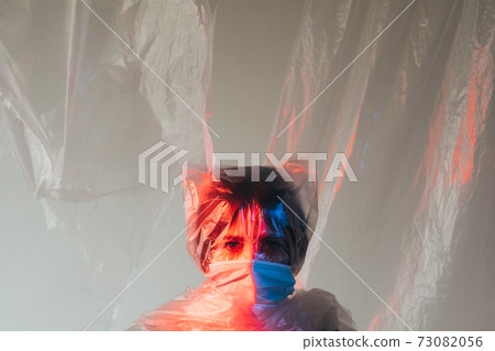 pandemic self isolation defocused woman face mask pandemic self isolation defocused woman face mask 73082056