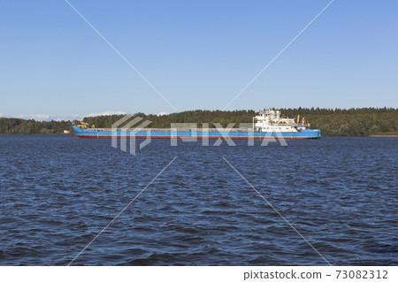 Dry-cargo vessel Volgo-Don 5056 passes through the Sheksna River in Vologda Region, Russia Dry-cargo vessel Volgo-Don 5056 passes through the Sheksna River in Vologda Region, Russia 73082312