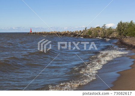View of the jetty from the beach in the town of Belozersk 73082617