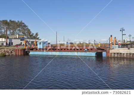 Ilyinskaya ferry through Belozersky bypass canal in the city of Belozersk Vologda region Ilyinskaya ferry through Belozersky bypass canal in the city of Belozersk Vologda region 73082621