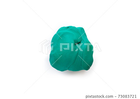 Plasticine clay on white background. Plasticine clay on white background. 73083721