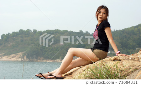 girl take a sun bathing 73084311