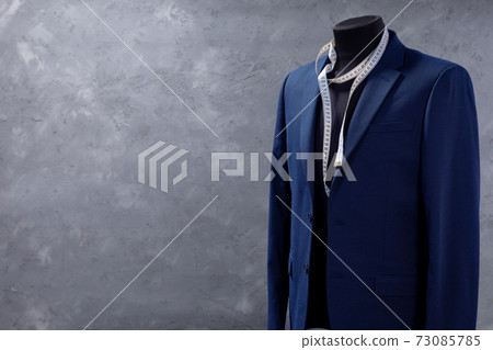suit jacket on male tailor mannequin and sewing tools suit jacket on male tailor mannequin and sewing tools 73085785