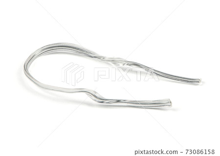White plastic coated wire tie used for a variety of things White plastic coated wire tie used for a variety of things 73086158