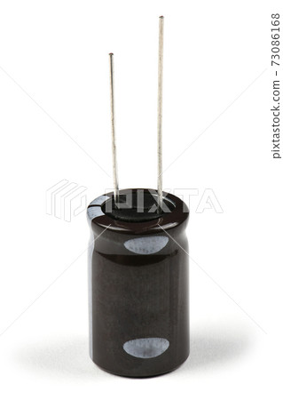 Electrolytic capacitor isolated on white Electrolytic capacitor isolated on white 73086168