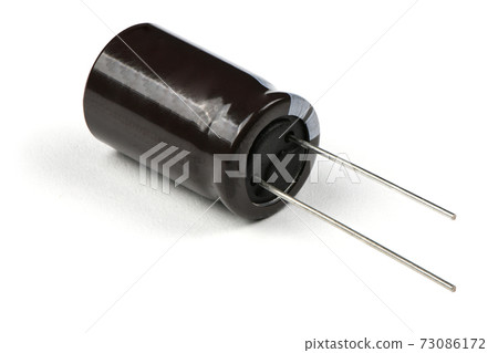 Electrolytic capacitor isolated on white Electrolytic capacitor isolated on white 73086172