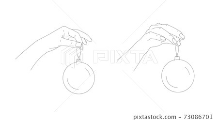 illustration of Hand holding a Christmas ball, two positions of hand. Sketch vector illustration in line art style, isolated on a white background. 73086701