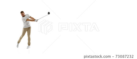 Golf player in a white shirt practicing, playing isolated on white studio background 73087232