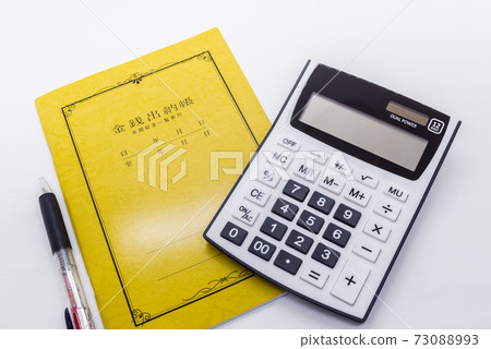 Money account book and calculator (household account book image) 73088993