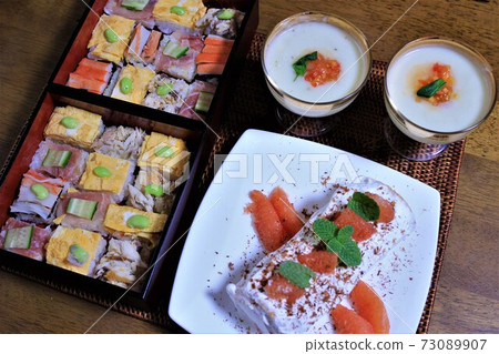 Homemade Christmas mosaic sushi, Swiss roll, cauliflower soup 73089907