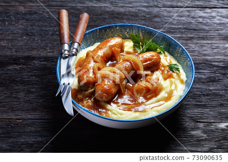 Bangers and mash traditional british dish top view Bangers and mash traditional british dish top view 73090635