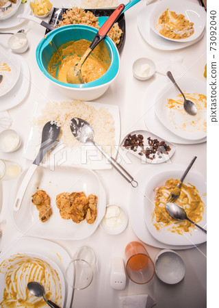 Beautiful ready lunch on dining table in modern home Beautiful ready lunch on dining table in modern home 73092040