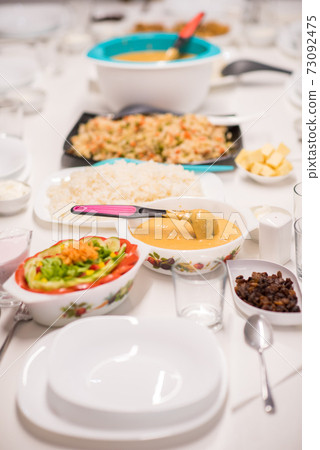 Beautiful ready lunch on dining table in modern home 73092475