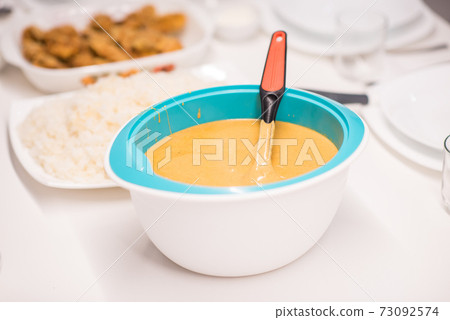 Beautiful ready lunch on dining table in modern home Beautiful ready lunch on dining table in modern home 73092574