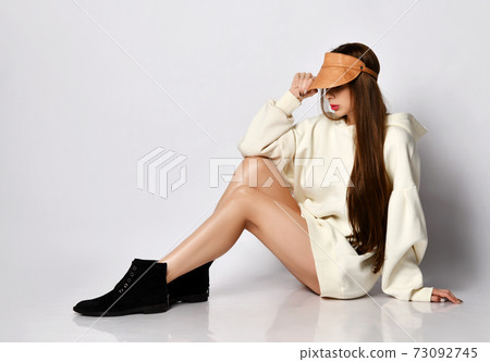 Sexy rich young woman with long hair in oversized 73092745